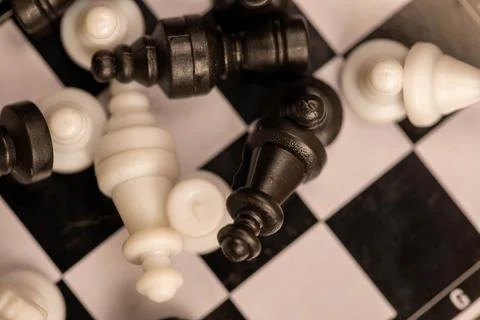 Chess pieces on a chessboard. Close-up, selective focus Stock Photos