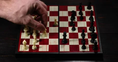 Chess pieces on a chessboard. The knight knocks down the queen. Business conc Stock Footage 148353451