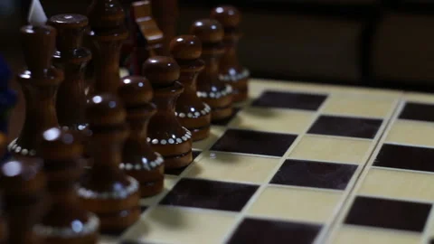 Chess pieces confront on a chessboard Stock Footage 102573994