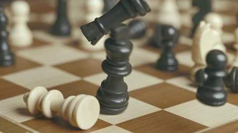 Chess pieces fall on a king Stock-Footage 233928176