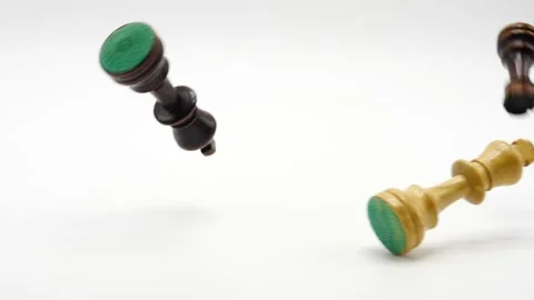 Chess pieces falling as slow motion isolated on white king falling Stock Footage 218081393