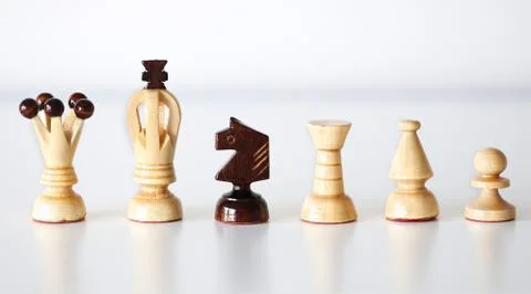 Chess pieces in a row Stock Photos