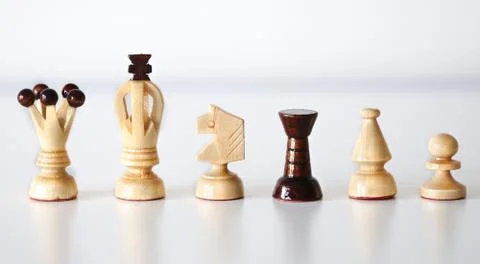 Chess pieces in a row Stock Photos