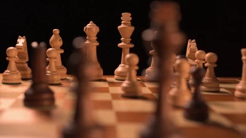 Chess pieces set ready for a new match isolated on black background Video stock 116270189