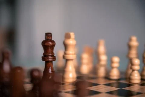 Chess pieces set up ready to play chess game on a wooden board strategy game  Stock Photos