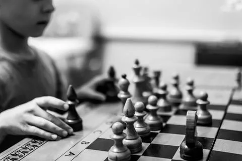 Chess pieces stand on the board. selective focus. Concept of children education Stock Photos