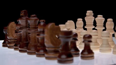 Chess pieces on white background, close-up Stock Footage 79789808