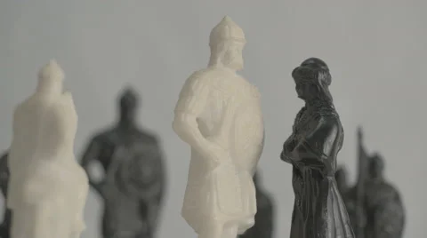 Chess pieces. White King vs Black queen. Retinue. Stock Footage 43241146