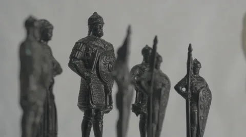 Chess pieces. White king vs Black king and his retinue Stockbeeldmateriaal 43241393