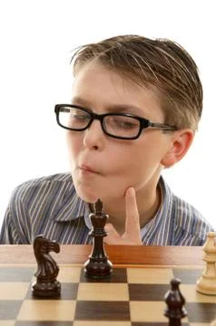 Chess player analyzing next move Stock Photos