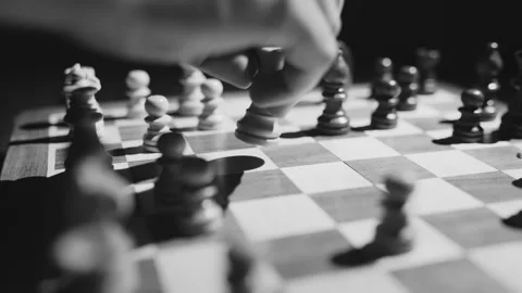 Chess player concedes by knocking over king 스톡 동영상 262007945