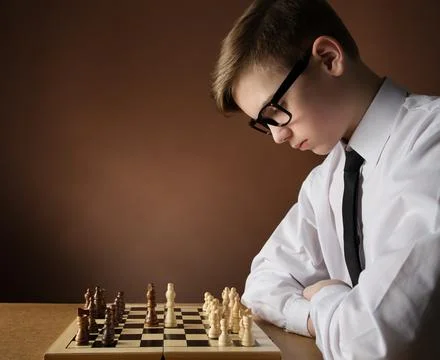 Chess Player Concentrate Thinking about Game Strategy at Chessboard. Stock Photos