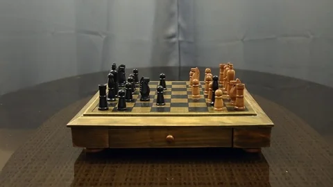 A chess player makes a move. Stock Footage 78611838