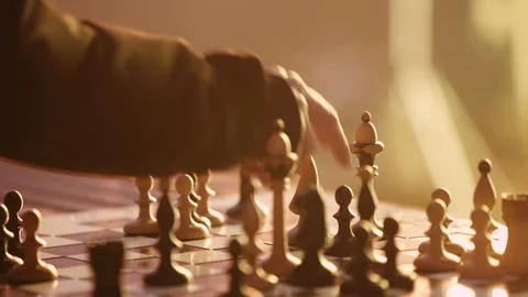 Chess player moves chess pieces  Stock Footage 167905243