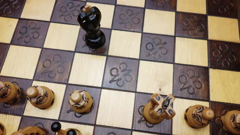 Chess player moves on the chessboard Stock Footage 133182536