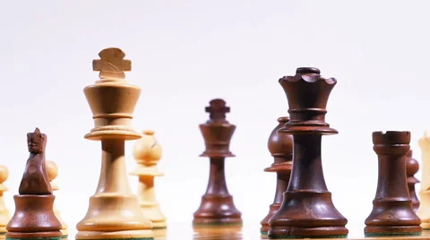 Chess Queen Takes King Checkmate Isolated on White in Slow Motion Stock Footage 56688968