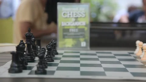 Chess Set and Reservation Sign on Outdoor Table Stock Footage 341323549