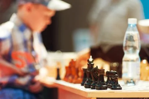 Chess standing on chessboard prepared for start Stock Photos