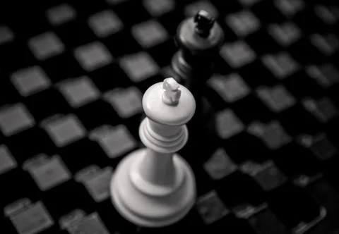 Chess table with black and white chess pieces in close up concept. Stock Illustration