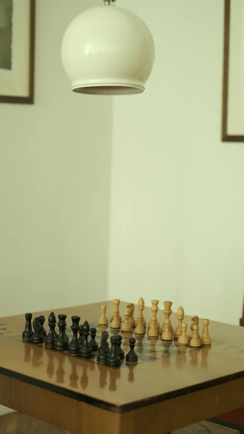 Chess on table, chess game. vitage cinematic interior lamp old furniture Stock Footage 280119057