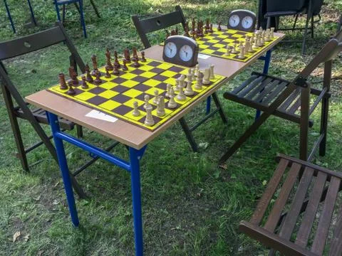 Chess table with clock  in the park Stock Photos