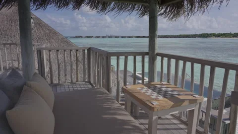 Chess Table on Overwater Villa Deck at Gili Lankanfushi Maldives Stock Footage 341313383