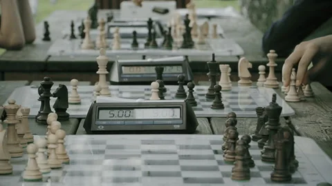 Chess tournament in the Park, chess clock, summer day Stock Footage 114571528