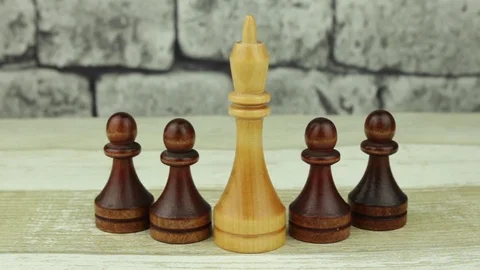 Chess white king and black pawns Stock Footage 78339094