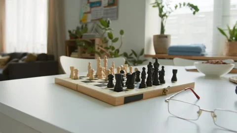 Chessboard and Glasses on Table in Retirement Home Stock Footage 337613654