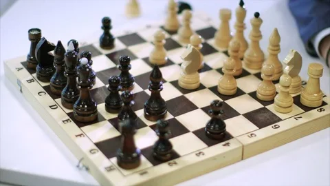 A chessboard and several moves of chess pieces Stock Footage 75153655