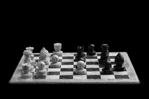 Chessboard on a black background Stock Photos