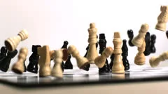 Black chess piece falling over, Stock Video