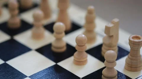 Chessboard with combination of white and black wooden chess figures Stock Footage 229473737