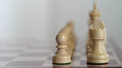 Chessboard, start setting up, view on white figures (with slider) Stock Footage 110937751