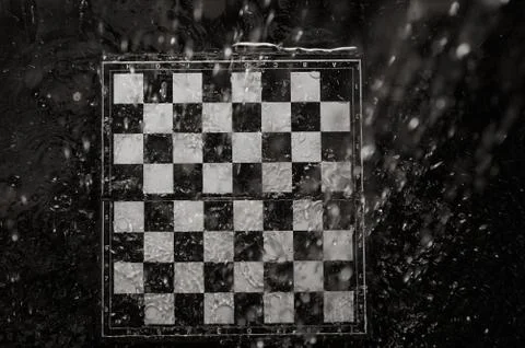 Chessboard under the rain Stock Photos