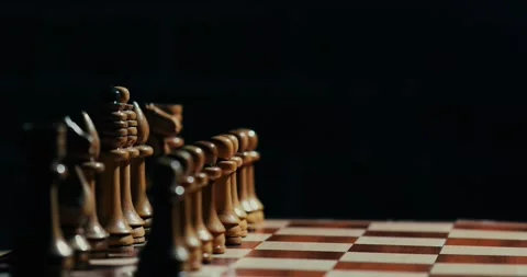 A chessboard with the white pieces in motion Stock Footage 130994220