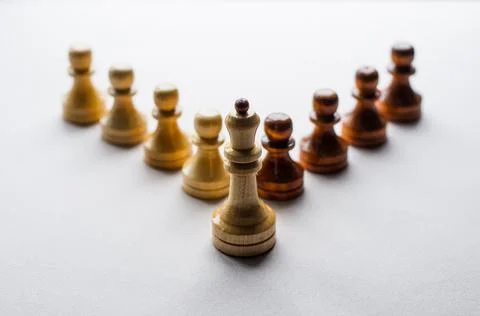 Chessmen - figures depicting relations between people, social behavior - grou Stock Photos