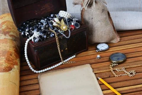 Chest  and old map. Stock Photos