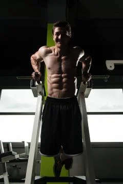 Chest And Triceps Exercise on Parallel Bars 写真素材