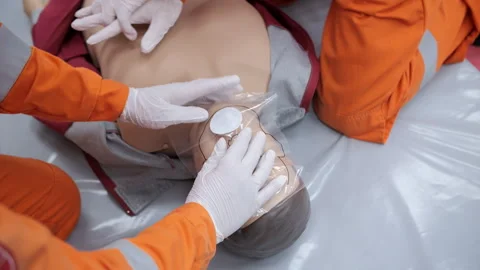 Chest Compression Training on Mannequin Stock Footage 321527026