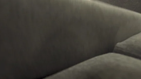 A chest of drawers of an angular black stylish sofa smoothly opens Video stock 127625968