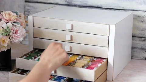 Chest of drawers for storing threads for embroidery. Equipment for embroiderers Stock Footage 220520847