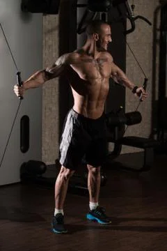 Chest Workout With Cables Stock Photos