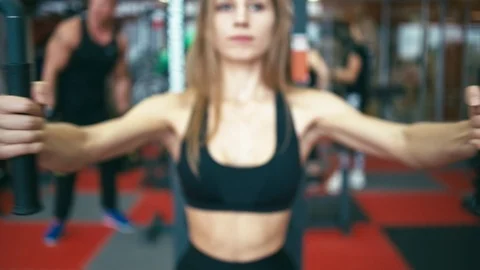 Chest workout in gym machine Stock Footage 94590415