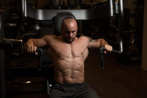 Chest Workout On Machine Stock Photos