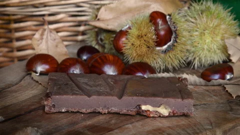 Chestnut cake with freshly picked chestnuts, hedgehogs and chestnut leaves Stock Footage 163088009