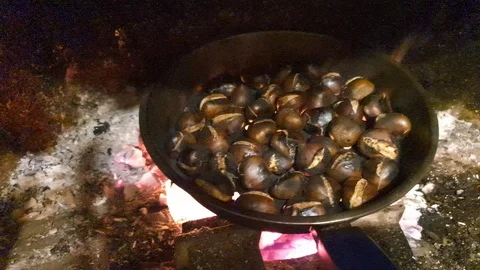 Chestnut cooking in the fireplace Stock Footage 117369479