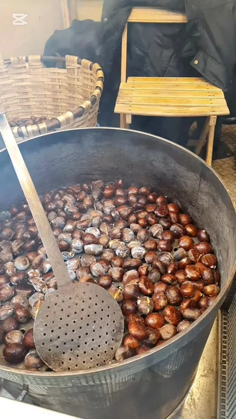Chestnuts being cooked in the shells roasting. Vídeos de archivo 295894144