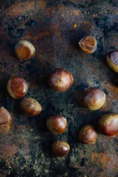 Chestnuts on black Stock-Fotos