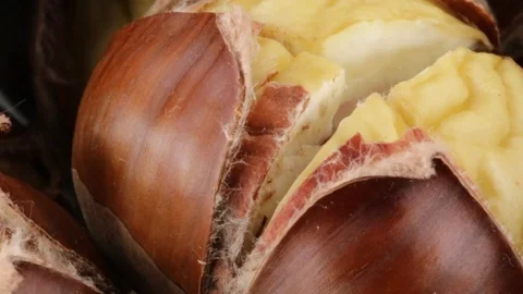 Chestnuts cooked in the oven Stock Footage 95703992